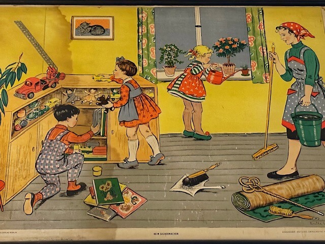 Eine alte Schulkarte mit einer Abbildung zum Thema Saubermachen